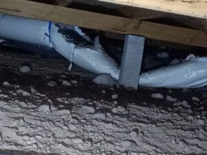 damaged duct under crawlspace